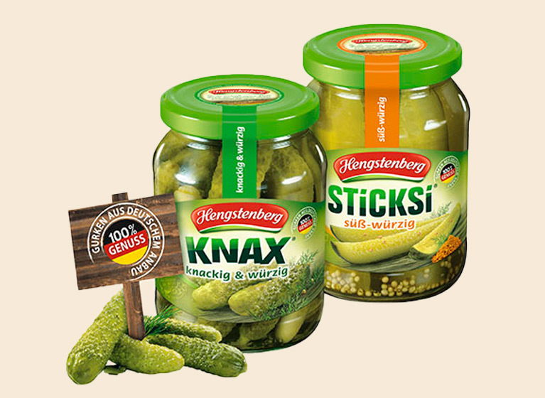 A jar of KNAX gherkins and a jar of Sticksi gherkins.